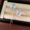 Brincos assimétricos com franjas, zircônia e flores de borboleta com aplicação de esmalte, brincos personalizados e da moda, sensação de luxo leve e alta qualidade, atacado