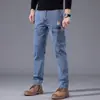 Jeans casuales de alta gama estilo americano de alta calle, ajustados, multibolsillos, para comercio exterior transfronterizo, disponibles en cuatro colores 2026
