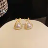 Aretes coreanos de nuevo estilo en forma de corazón cruzado, pequeños, simples y versátiles, al por mayor