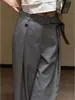 Pantalones de traje grises de alta gama, estilo francés sofisticado para el trabajo, principios de otoño de 2026, estilo europeo súper popular, muy elegantes, para figura de pera, pantalones de pierna ancha que disimulan las caderas