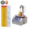 Máquina automática de llenado de aceite de cocina y aceite comestible Máquina de llenado cuantitativo por peso de salsa de sésamo, pasta de pera y miel