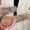 Estilo europeu e americano, pulseira de metal trançado com punho aberto única, apresentando um design exagerado e de nicho, nova joia da moda 2026