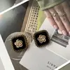 Estilo Chanel retro cuadrado flocado flor botón metálico traje de mujer abrigo de lana abrigo botón decorativo de punto