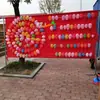 En la Plaza Metabo, los puestos ofrecen juegos de tiro al globo, con un telón de fondo para ferias de templos, parques, mercados nocturnos y centros comerciales, donde puedes ganar premios disparando globos.