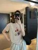 Transpirable con sensación de oxígeno, estampado de frutas, manga corta, holgada, casual, que disimula la figura, ajustada, camiseta para mujer, top de verano 2026