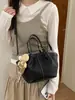 Bolso Cruzado de Hombro de Moda Coreana Transfronterizo de Gama Alta Bolso de Mano de Lujo Ligero de Temperamento Simple Bolso Cubo Elegante de Color Sólido