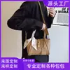 Bolsa de mão vintage de nicho para mulheres, nova bolsa transversal versátil de alta qualidade, bolsa de ombro tipo balde popular, personalizável