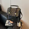 Mochila Retro Estampa de Leopardo Transfronteiriça Nova Moda Feminina Versátil Bolsa de Ombro Transversal Mochila Pequena Portátil de Alta Qualidade