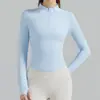 Top de yoga deportivo de manga larga con media cremallera, corte ajustado, color liso, cómodo para entrenamiento de fitness y correr