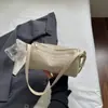 Bolso de textura tejida casual y relajado, nuevo bolso de hombro o axila de moda 2026 color sólido, bolso de mano simple para el día a día