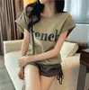 2025 Nueva Celebridad de Internet Ins Super Caliente Adelgazante Hombro Caído Dulce Cool Camiseta de Manga Corta Holgada para Estudiante de Verano Top de Moda
