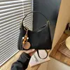 Bolso Casual para Mujer de Otoño 2026 Transfronterizo, Bolso de Mano Versátil de Alta Gama, Bolso Cruzado Tipo Bollo de Gran Capacidad