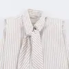 Al por mayor comercio exterior estilo europeo y americano verano moda femenina versátil corbata de lazo hombrera acolchada sin mangas a rayas blusa top