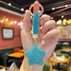 Llavero de Estrella de Dibujos Animados Coreanos con Pedrería Completa, Accesorio de Bolso de Moda y Lujoso para Mujer, Cadena de Garra Linda Colgante Pequeño de Estrella de Cinco Puntas