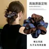 Goma para el pelo con estampado vintage azul para mujer, Accesorio de moda y elegante para moño con un toque de alta gama
