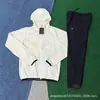 Traje de Otoño e Invierno 2025 Nuevo Pantalones de Seda Helada de Secado Rápido Chaqueta Deportiva Casual con Cremallera y Capucha Ropa de Protección Solar para Hombres y Mujeres Tendencia