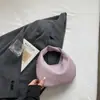 Bolsa Feminina Estilo Coreano Nuvem 2026 Nova Textura Macia Bolsa de Mão para o Trabalho Bolsa Bolinho Simples Moda Bolsa de Mão Pequena