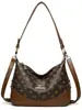 Bolsa de Dumpling Vintage Canguro 2026 Nueva Moda Versátil Bolso de Hombro Cruzado para Mujer Gran Capacidad Bolso para Mamá de Mediana Edad