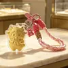 Venta Caliente Año del Cordero Tener Dinero para Gastar Llavero Dorado Oro Puro 999 Correa para Teléfono Colgante de Bolso Empaque de Caja de Regalo Regalo para Conducir