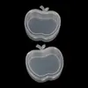 Caja vacía transparente de dibujos animados con forma de manzana al por mayor, caja de almacenamiento de plástico pp, caja para tapones para los oídos, caja para auriculares, caja para accesorios con cuentas y gomas elásticas