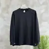 Camiseta de manga comprida com gola redonda e cor sólida estilo americano, uma peça versátil e casual para camadas de outono para homens, apresentando um corte solto, design moderno e um estilo novo e simples