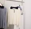 Elegante suéter de punto con cuello polo de color bloque, suéter de lana sedosa, jersey base holgado y cómodo, top tipo camiseta