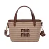 Bolsa de Palha Tecida de Verão 2026 Novo Estilo Estilo Resort Moda Casual Uso Diário Bolsa de Balde Tecida Bolsa de Mão Bolsa de Ombro