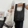 Bolso de Mano de Hilo Mate Personalizado por el Fabricante Bolso de Mano con Borde de Bloqueo de Color Sólido Bolsa de Malla Transparente para Almacenamiento y Compras