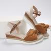 2024 Verano nuevo Europeo y Americano peep toe talla grande lazo hebilla cuña plataforma casual talla grande sandalias de mujer