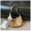 Bolso casual de nicho estilo coreano transfronterizo para mujer, nuevo bolso versátil de moda para el trabajo, bolso de hombro y cruzado simple de alta calidad