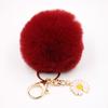 Venta Caliente Llavero Colgante Bola de Pelo de Margarita Moda para Mujer Bolso Felpa Monedero Coche Colgante Girasol