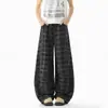 Pantalones casuales nuevos para hombre, pantalones rectos a cuadros y con rayas deportivas que hacen que las piernas se vean más largas, pantalones de pretina ajustable a cuadros negros y grises