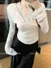 Capa interior de encaje morado con escote en V pronunciado y diseño de corte bajo, estilo puro y sexy impresionante, camiseta para chica popular de primavera y otoño, top ajustado para mujer
