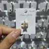 Clip de Hueso de Oreja con Flor de Pedrería Cruzada para Mujer Sin Perforación Clip Sencillo Moda Sensación de Alta Gama Pendiente Joyería Venta al por Mayor