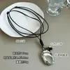 Cordón de Cuero Negro Colgante Ovalado Collar Largo Cadena para Suéter Simple Versátil Gama Alta Lujo Ligero Geométrico Moda Estilo Unisex