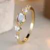 Anel Fino Rongxing Transfronteiriço com Pedra Principal Oval, Pedras Redondas Adornadas em Ambos os Lados do Anel, Anel Delicado e Luxuoso para o Dia a Dia