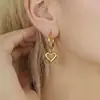 Pendientes de aro con colgante en forma de corazón minimalista de alta gama europeos y americanos, material de acero inoxidable, chapados en oro real de 18 quilates, pendientes de diseño nicho
