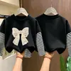 Camiseta para niña, algodón puro, a rayas, manga larga, nuevo modelo primavera y otoño 2026, camiseta básica para niñas estudiantes, top para niños