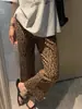 Pantalones retro de leopardo de estilo nicho ligeros para otoño para mujer, pantalones cropped holgados adelgazantes de principios de otoño con microcampana