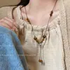 Collar de Metal con Lazo Retro Desgastado Étnico Bohemio Simple Versátil Cadena Larga Colgante Redondo