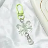 Llavero de lazo colorido con perlas, accesorios hechos a mano para fundas de teléfono, audífonos, bolsos y accesorios de ropa