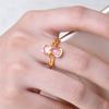 Anillo de gato lindo con cristal rosa chapado en oro europeo y americano, apertura de diamante, temperamento dulce, anillo de gato de cristal rosa al por mayor