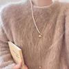 Collar de lujo ligero con temperamento de cadena larga dorada de hueso de serpiente de otoño e invierno con piedra ojo de tigre de alta calidad, accesorios para mujer