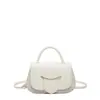 Bolsas de mano cuadradas pequeñas frescas y elegantes al por mayor para mujer, nuevo modelo de verano 2026, bolso de hombro patchwork único, bolso cruzado para el trabajo