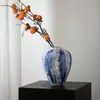 Vaso de Cerâmica Moderno Minimalista Jingdezhen Armário de Exibição Recipiente para Arranjo de Flores Azuis Prateleira de Exibição para Sala de Estar Itens de Decoração de Alto Padrão