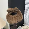 2026 Nueva Moda Versátil de Alto Valor Bolso Pequeño Peludo para Mujer Textura Lujo Ligero Bolso de Mano tipo Dumpling para el Trabajo