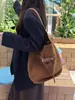 25 Bolso Cubo de Piel de Vaca Esmerilada Estilo Nuevo Otoño e Invierno Estilo Fila Gran Capacidad Bolso de Hombro Versátil Bolso Tote Venta al por Mayor