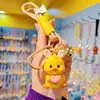 Llavero de pato de Navidad de dibujos animados de Año Nuevo para mujer, lindo, de moda, exquisita muñeca de resina, llavero, colgante para mochila escolar