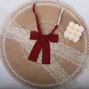 Gravata Borboleta Versátil JK para Formatura Temporada de Formatura para Mulheres Cor Sólida Estilo Japonês Pequena com Cabo Longo Gravata Borboleta de Estudante Estilo Universitário Uniforme de Bacharel