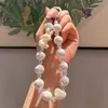 Cordón para Teléfono de Verano Dulce Corazón Dopamina Pulsera de Muñeca con Cuentas de Conejo y Corazón Llavero Antiperdida
